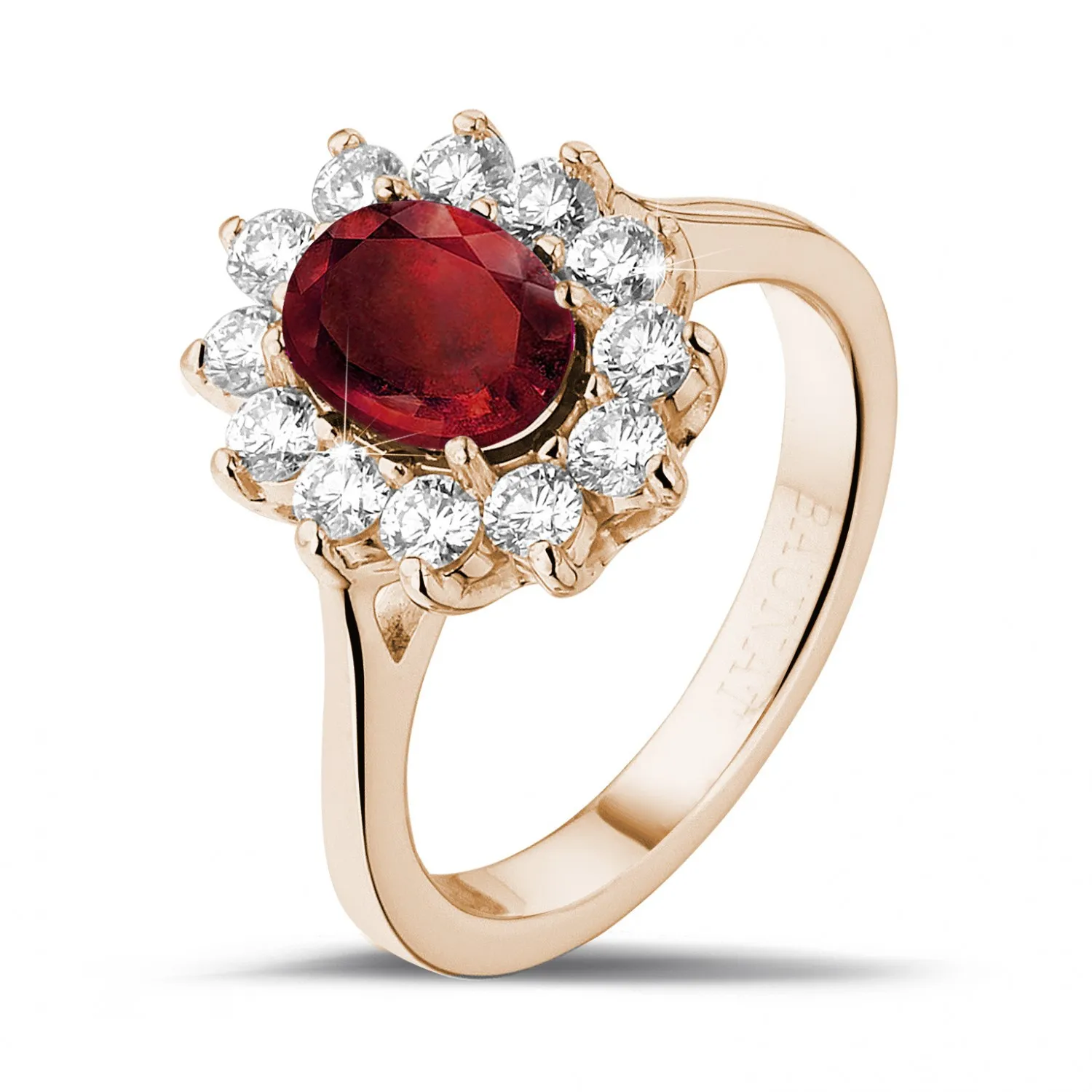 Anillo « entourage » en oro rojo con rubí ovalado y diamantes redondos 